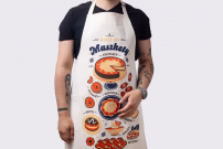 Karmelowy fortuch „Warza ino maszkety”